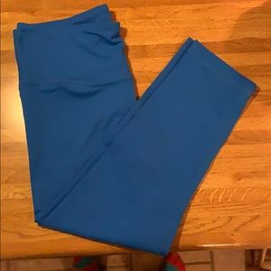 Blue leggings. Ankle length.